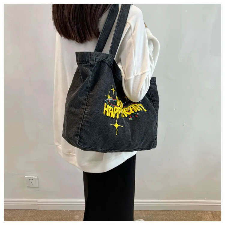 New Large Capacity Cowboy Shoulder Student's Canvas Schoolbag Women's Shopping Bag Street Dressing_voghion.com