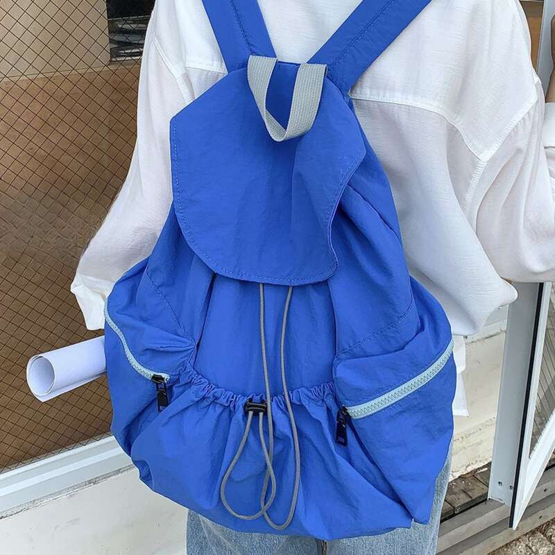 Nouveau sac à dos plissé en nylon avec cordon de serrage pour femme, tendance de niche, sac à dos à rabat de grande capacité pour étudiante, sac à bandoulière pour filles_voghion.com