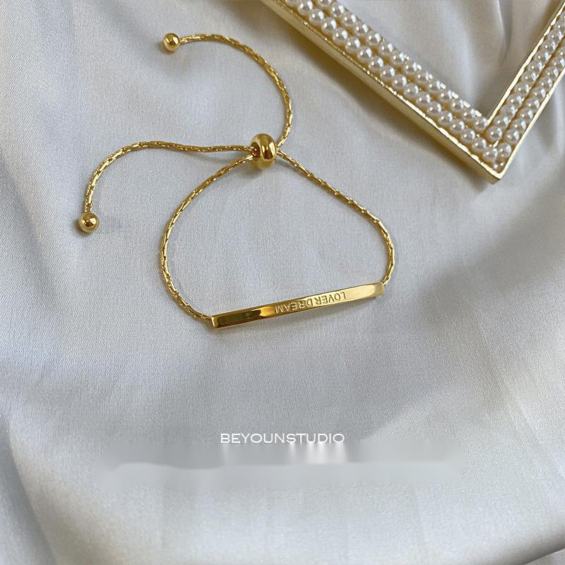 Braccialetto in acciaio al titanio con trazione, stile coreano, per donne di minoranza, lettere dorate, primavera ed estate, tutto abbinato_voghion.com