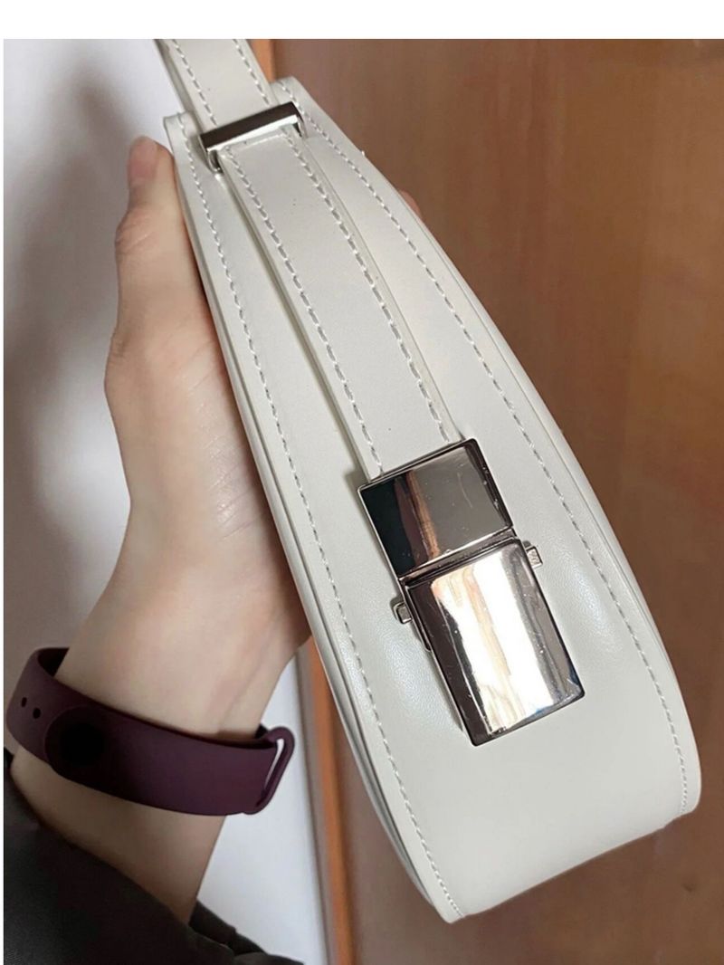 Eine Nischendesign-Schulter mit Halbmond für Frauen im Jahr 2024, neue personalisierte und minimalistische Tasche,_voghion.com