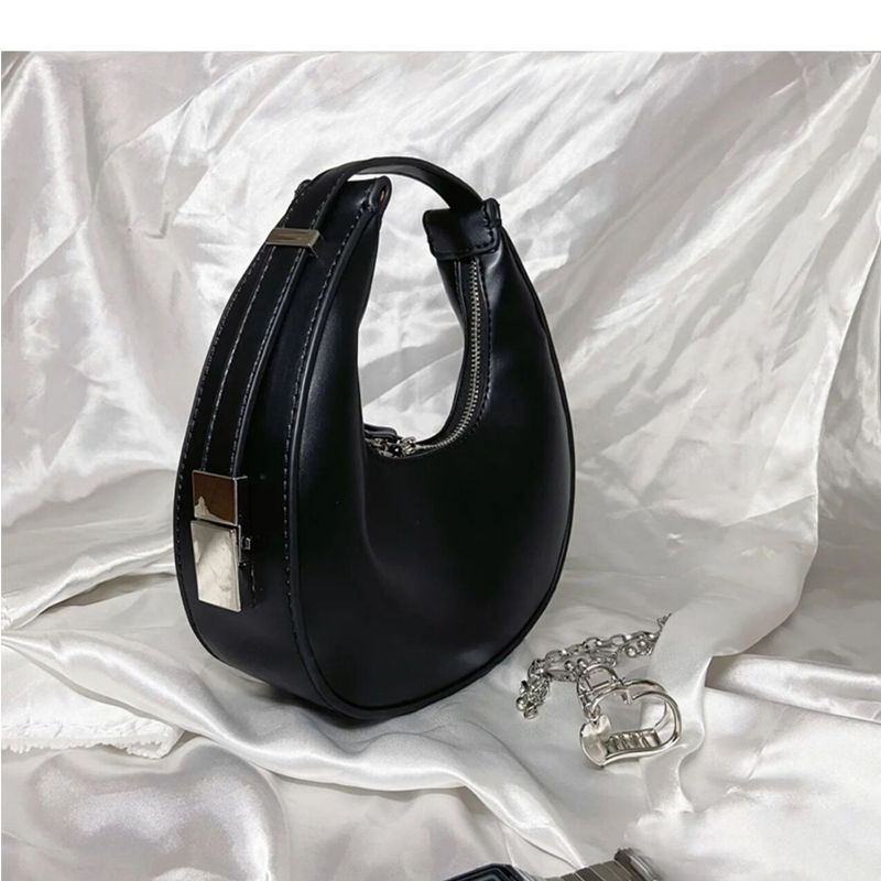 Eine Nischendesign-Schulter mit Halbmond für Frauen im Jahr 2024, neue personalisierte und minimalistische Tasche,_voghion.com