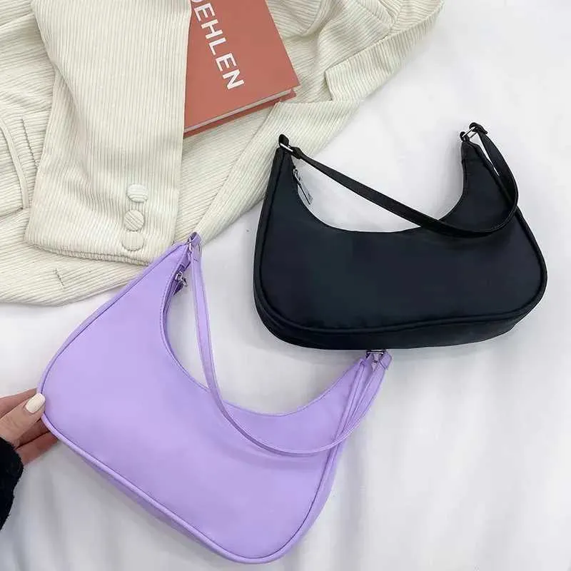 Wens Nyl Shoe 2023 Fi Solid Canvas Dumpg Unterarm Designer Tasche Cluh Geldbörse und Handtasche Y241026_voghion.com