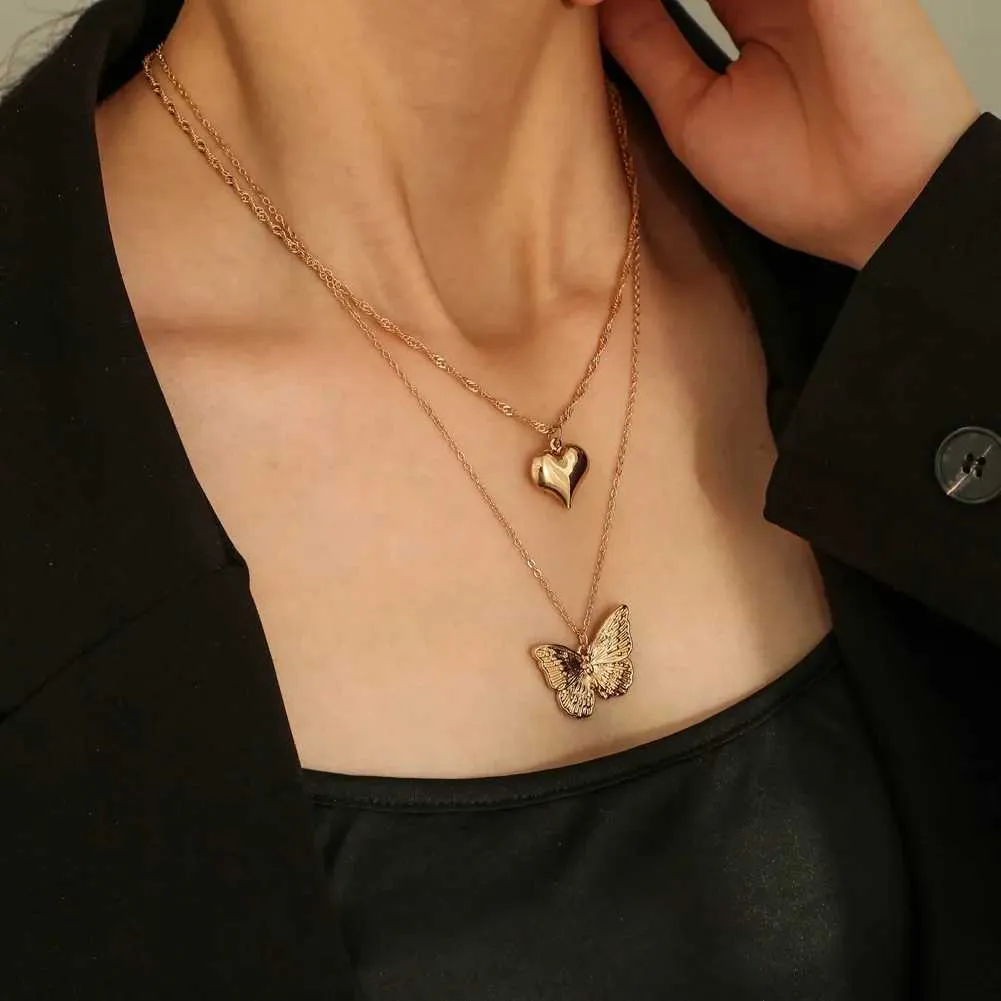 Colliers pendentifs rétro papillon doré en acier inoxydable avec chaîne serpent et breloque tendance pour femmes_voghion.com