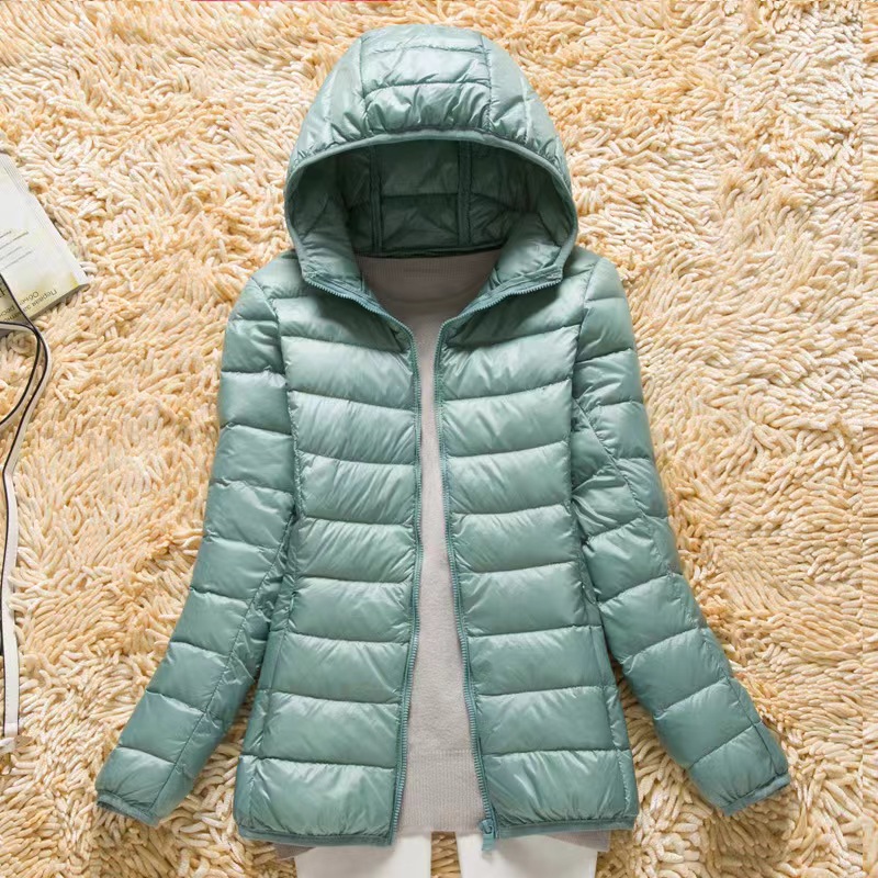 Vêtements pour femmes manteaux d'hiver courts nouvelle veste à capuche coupe ajustée grande taille avec sac de rangement