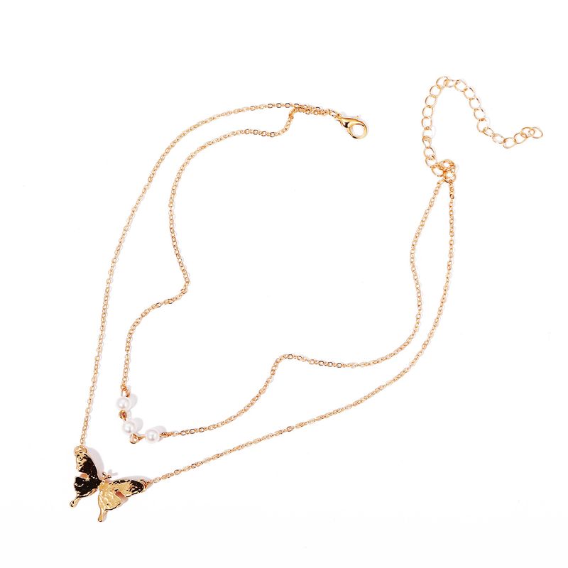 Collana con ciondolo a farfalla con doppia perla, catena per clavicola retrò creativa_voghion.com