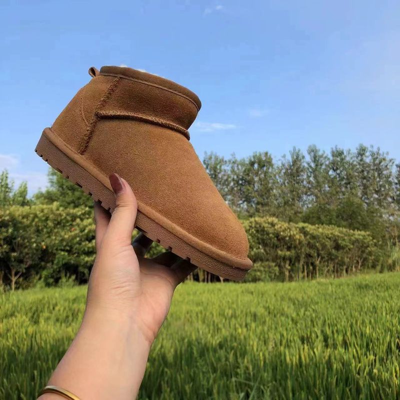 Rindslederwolle Braun Flache Absätze Lederfell Integrierte Runde Zehen Klebeschuhe Niedrig Geschnittene Mini-Schneestiefel_voghion.com