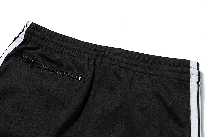 Mäns Needles-spår Fritidsbyxor Streetwear AWGE Träningsbyxor Kvinnor Herr Randig Dragkedja Byxa Butterfly Broderi Joggers Needles_voghion.com