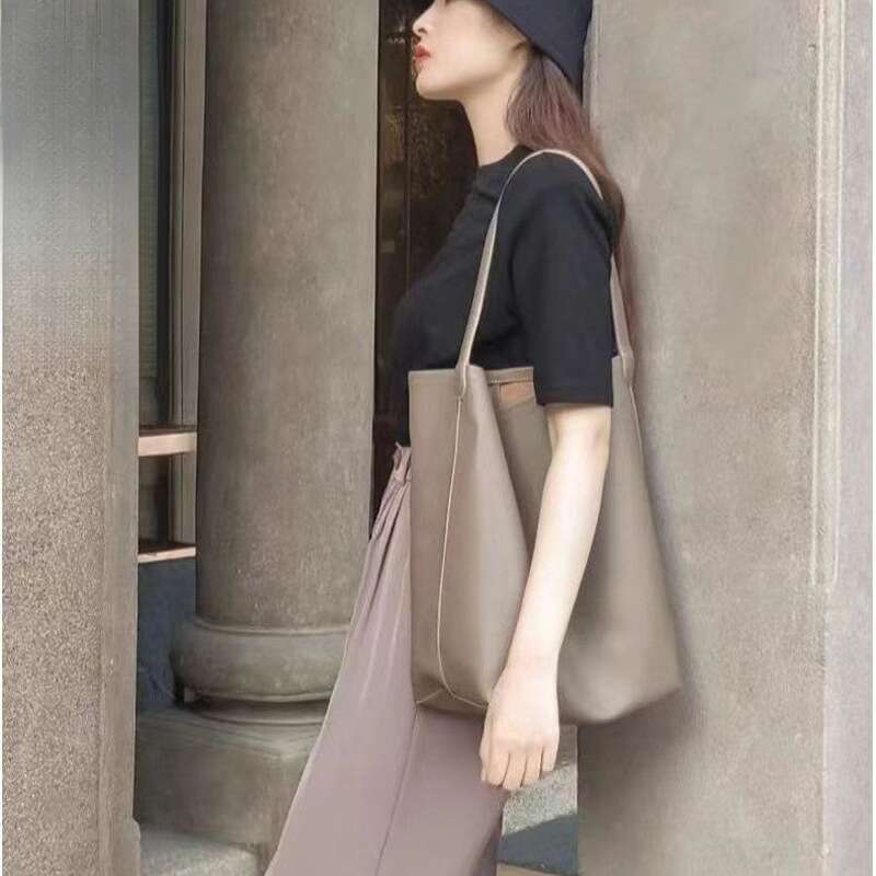 Borsa a mano da donna a tracolla in morbida pelle di grande capacità, a forma di secchiello_voghion.com