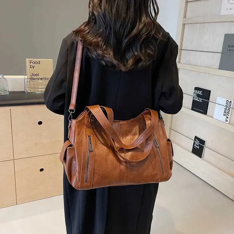Sacs à bandoulière à compartiment intérieur souple 2024 de haute qualité aux couleurs contrastées pour femmes Mode Fermeture éclair Pu Femmes_voghion.com