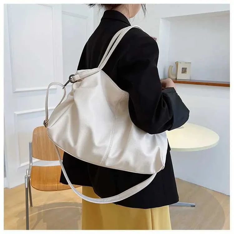 Large black shoulder large homeless shopping solid color high-quality leather cross body handbag womens travel bag_voghion.com