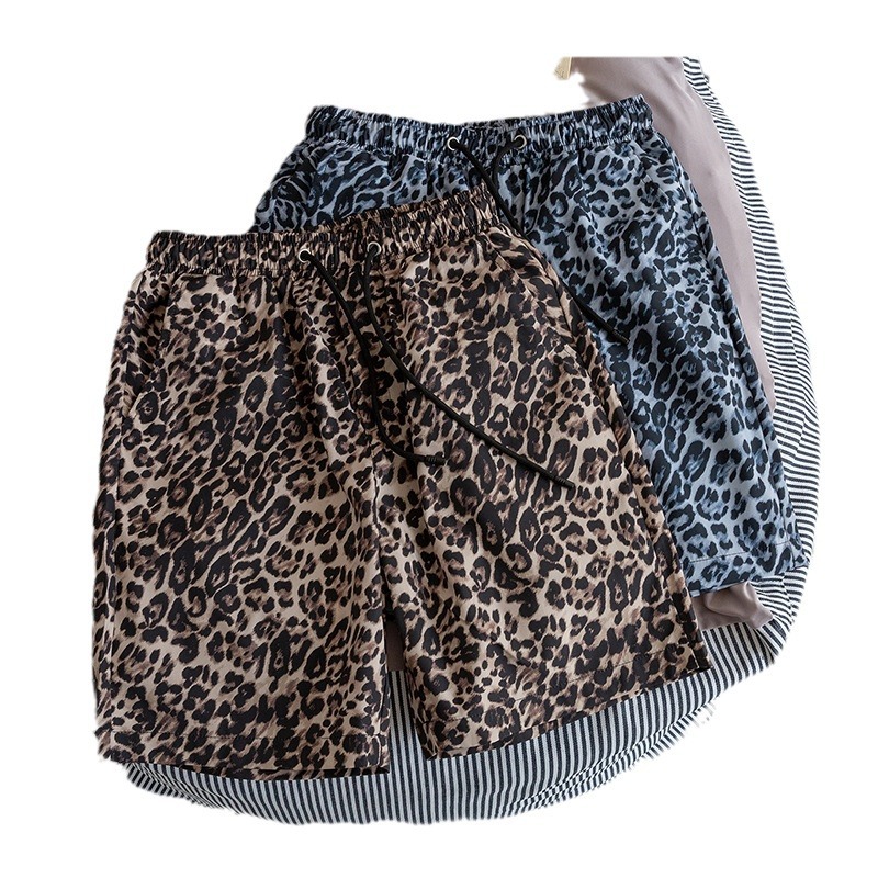 Vêtements pour hommes été 5 points imprimé léopard shorts hommes vêtements d'extérieur décontractés pantalons de plage couple mode 5 points pantalons shorts tendance_voghion.com
