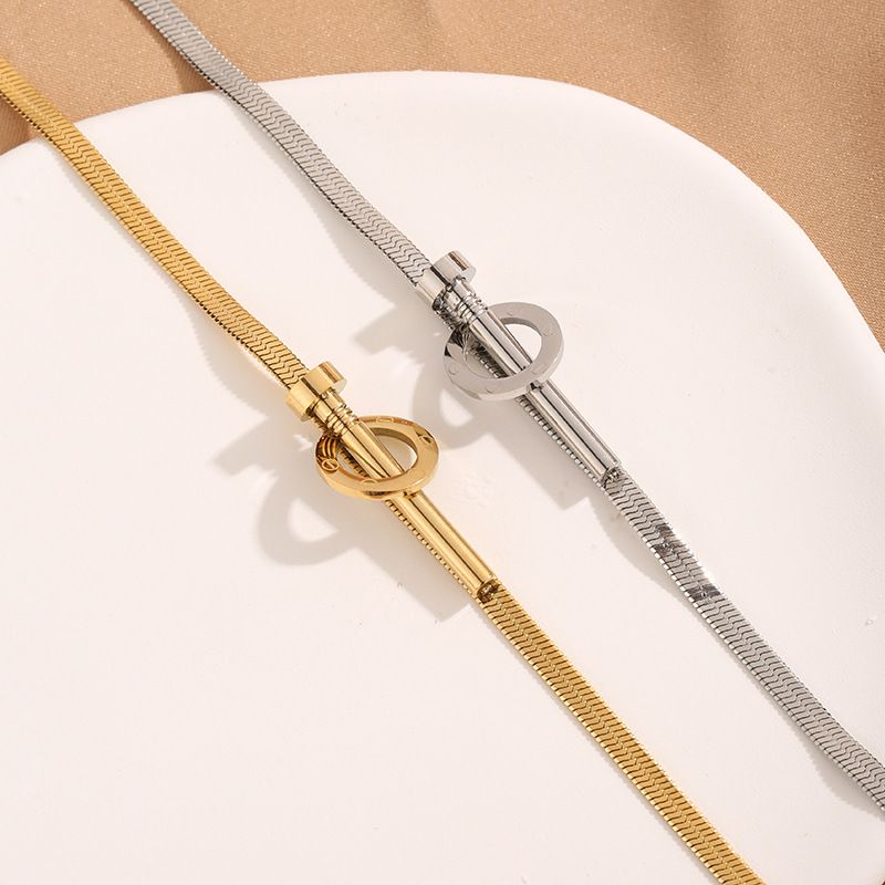 Braccialetto in acciaio al titanio e oro semplice stile Nail Light da donna_voghion.com