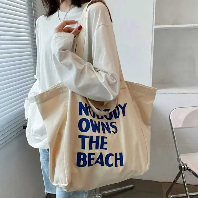 Large capacity retro letter printed canvas handbag with foldable design - perfect for casual shopping and daily use_voghion.com