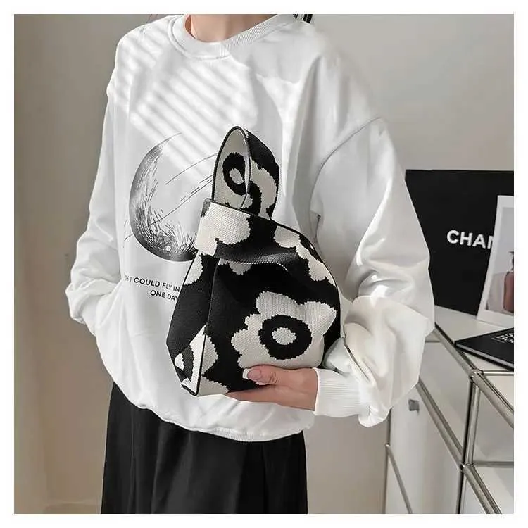 Borsa a mano in tela artistica giapponese di grande capacità, modello Geely, portafoglio con nodo casual e borsa da polso alla moda e versatile Wens_voghion.com