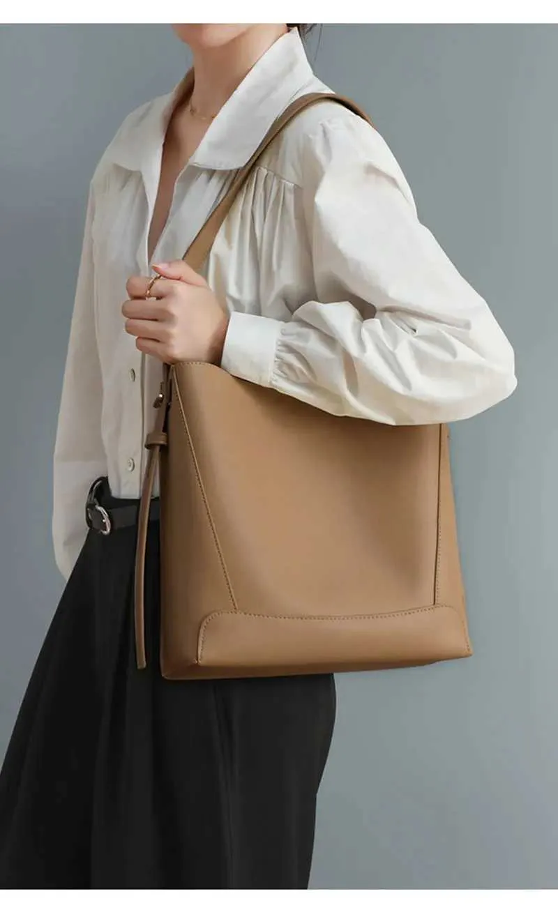 Denim shoulder fashion trend designer bucket large capacity genuine leather womens cross body bag Y241121_voghion.com