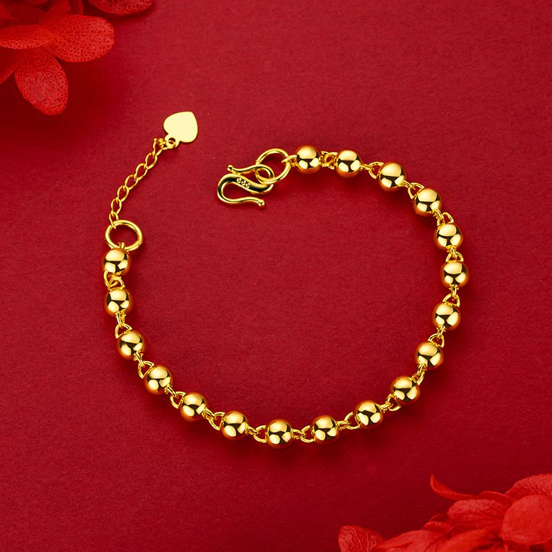 Bracciale con perline dorate da donna elegante tondo liscio_voghion.com