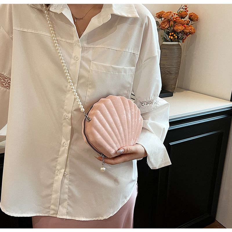 Einzigartige Nischentasche Damen 2024 Sommer neue Mode Perlen Umhängetasche ausländischer Stil einfache Muscheltasche_voghion.com