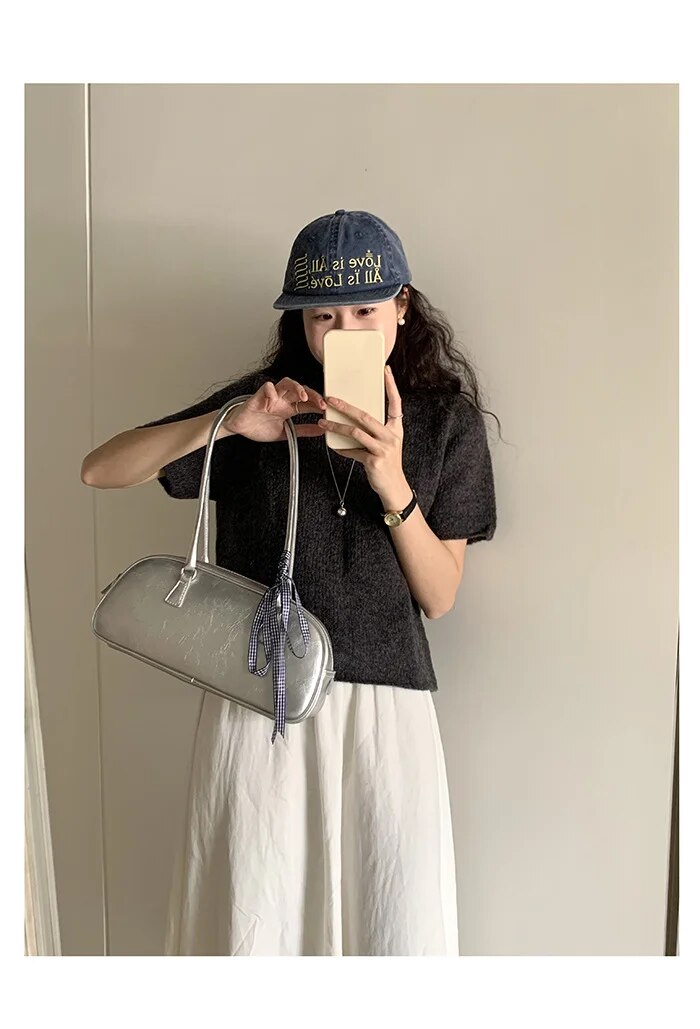 2024 Estate coreana Nuovo design di nicchia Borsa da donna portatile in stile balletto Tendenza moda Borsa versatile in argento con tracolla singola_voghion.com