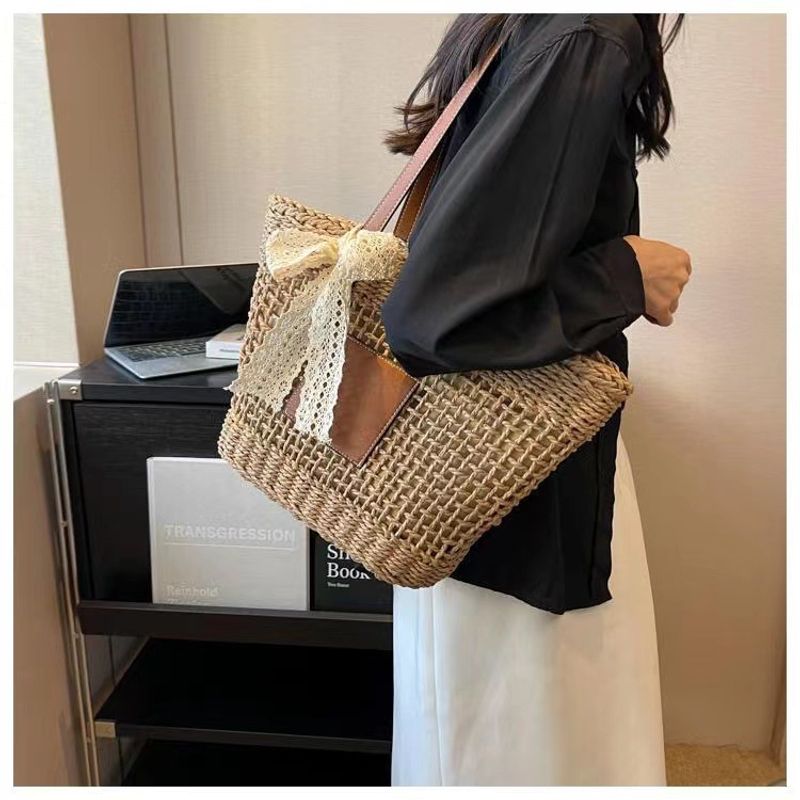 hollow shoulder new simple straw woven holiday style beach versatile women's bag_voghion.com