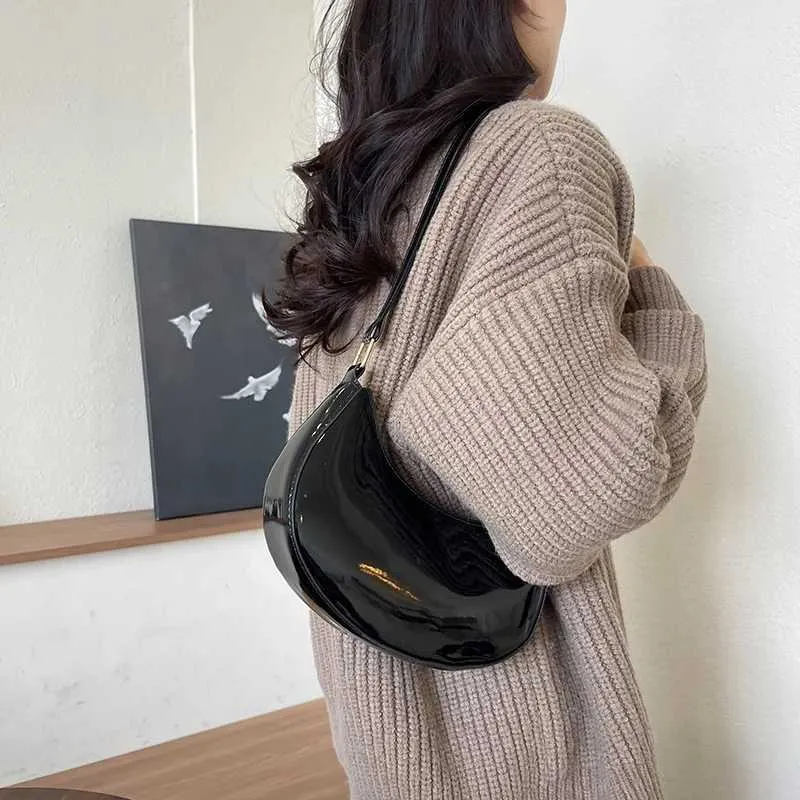 Designer Bag Fashionable new solid color bright textured light handheld zipper cross shaped bag Y241115_voghion.com