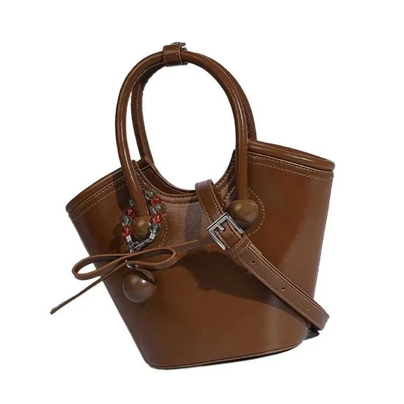 Elegante borsa a tracolla multiuso con accessorio pendente, borsa a tracolla per studenti e moda_voghion.com