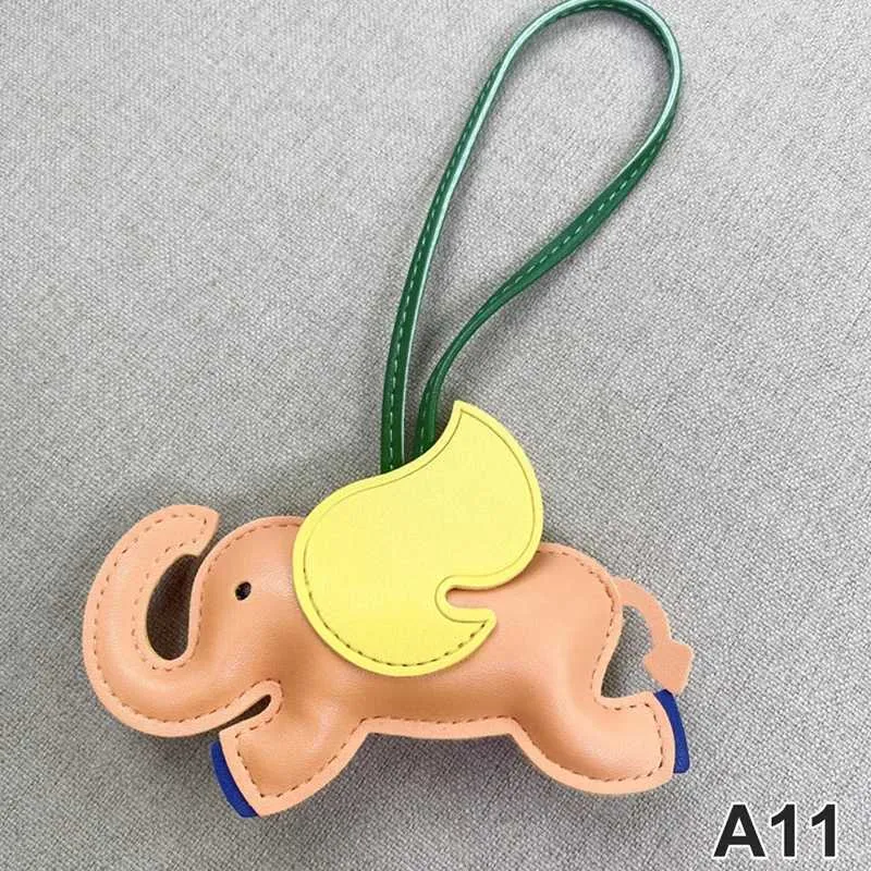 Designer de modă din piele PU aripi zburătoare elefant umeraș breloc pandantiv pentru femei accesorii pentru geantă de mână_voghion.com