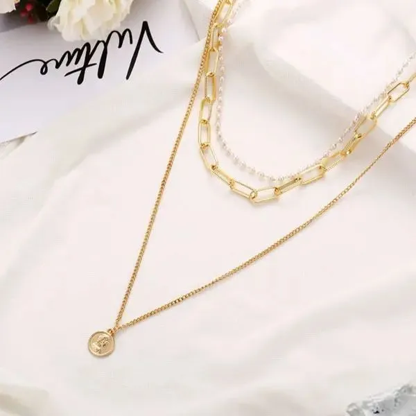 Collana in lega vintage creativa multistrato con catena di perle e timbro ritratto_voghion.com