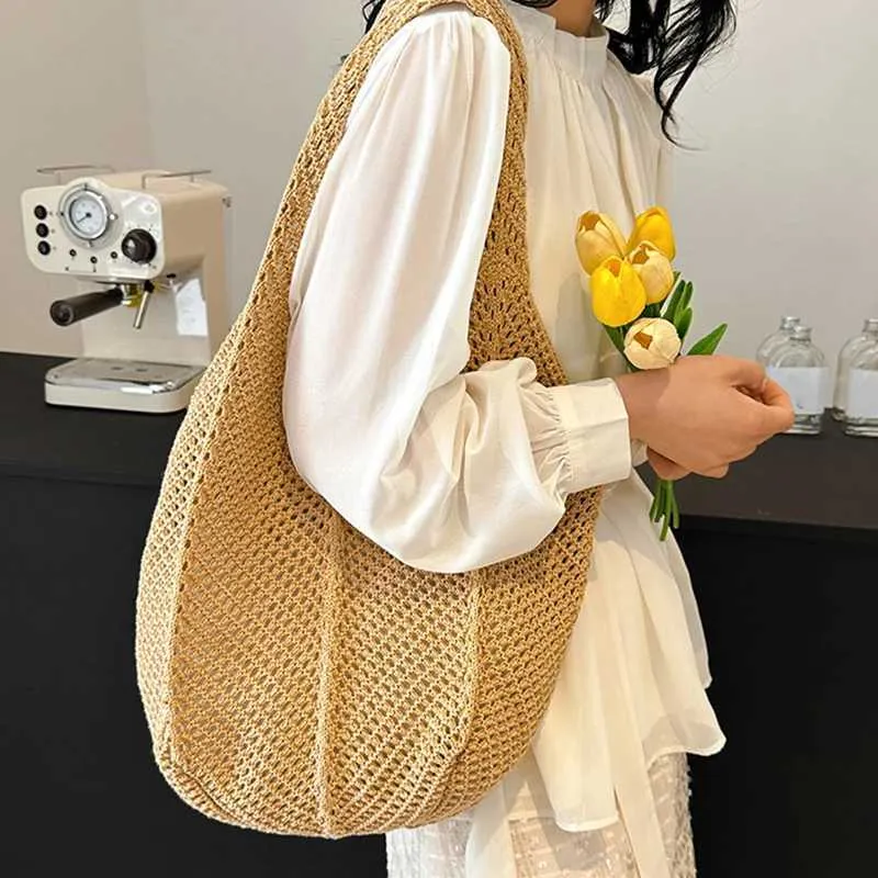 Womens crochet handbag mesh beach large capacity fashionable knitted shoulder solid color simple shopping bag Y241011_voghion.com