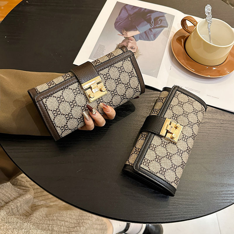 Beauté pour femmes 2024 Nouveau portefeuille court, de haute qualité, multi-cartes, triple boucle de verrouillage pliable, long portefeuille portable