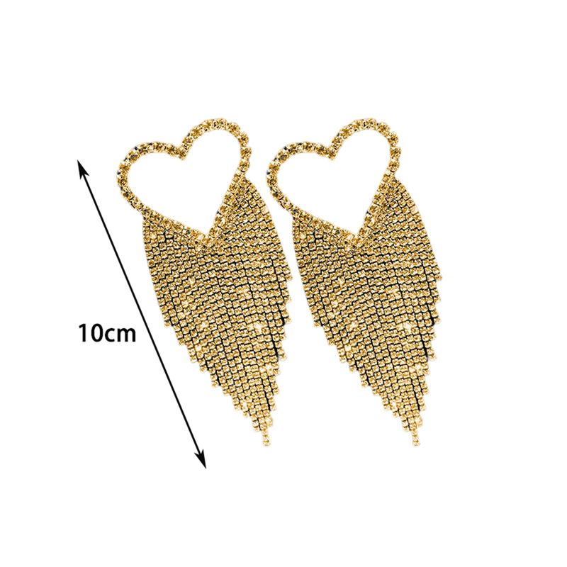 Orecchini pendenti a cuore con strass e nappe glitterate_voghion.com