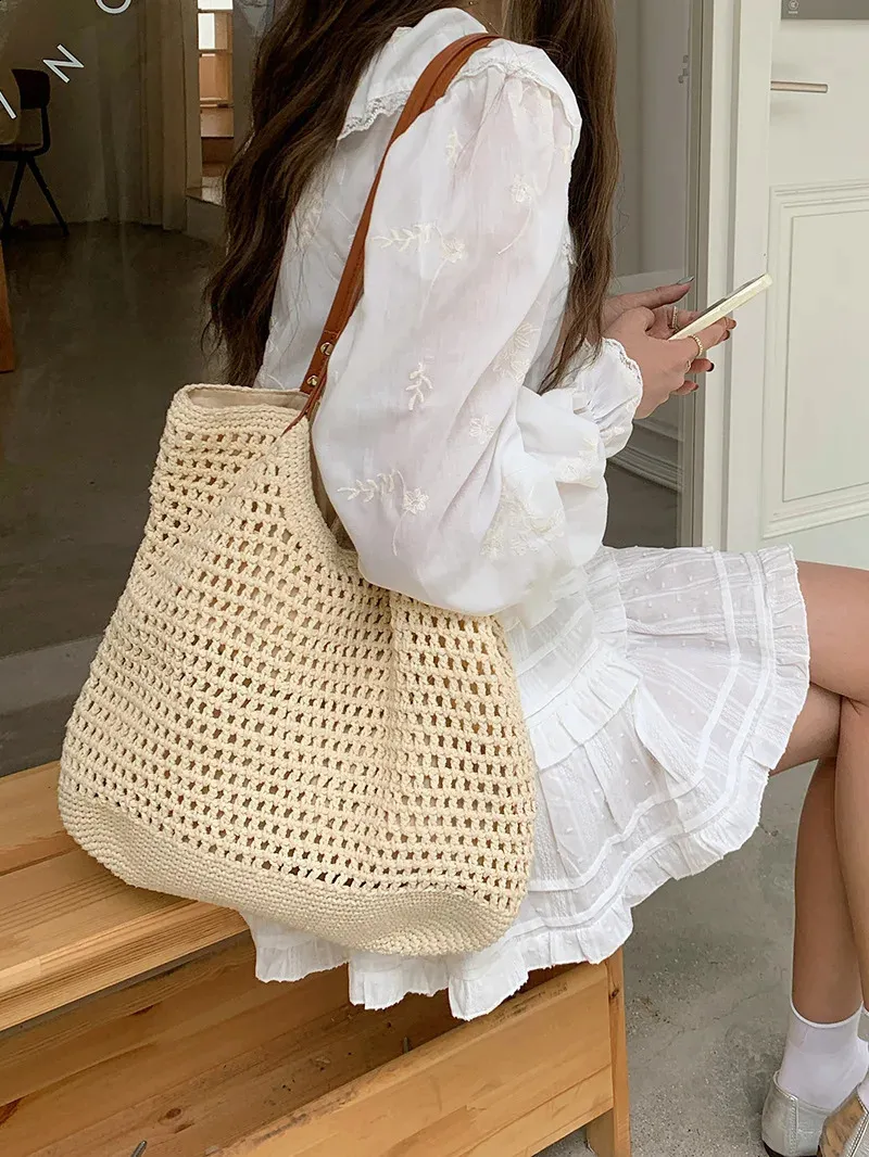 Sac à bandoulière de plage creux tissé grande capacité vacances portable affaires loisirs shopping simple joker haut sens_voghion.com