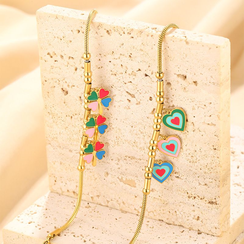 Bracciale personalizzato in acciaio inossidabile placcato oro con ciondolo a forma di quadrifoglio Dripping Love_voghion.com