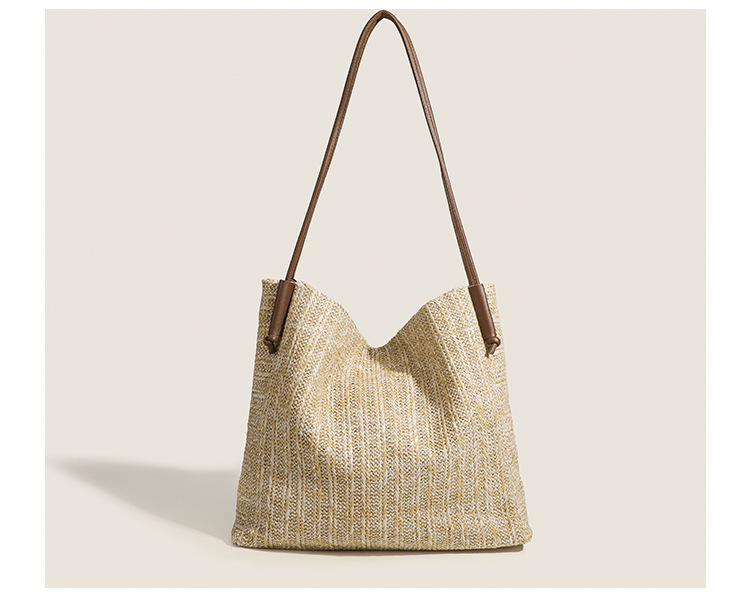 Grass woven tote bag for spring versatile women with niche design, large capacity commuting, seaside vacation style_voghion.com