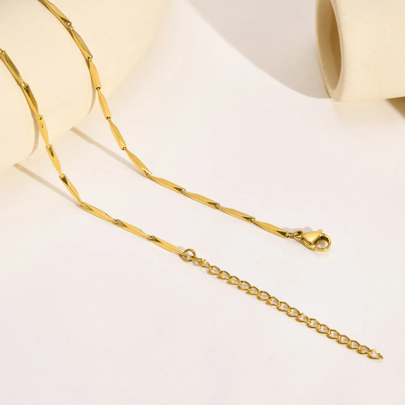 Melon Seed Kette Goldfarbene Edelstahlhalskette Mit S-anhänger_voghion.com