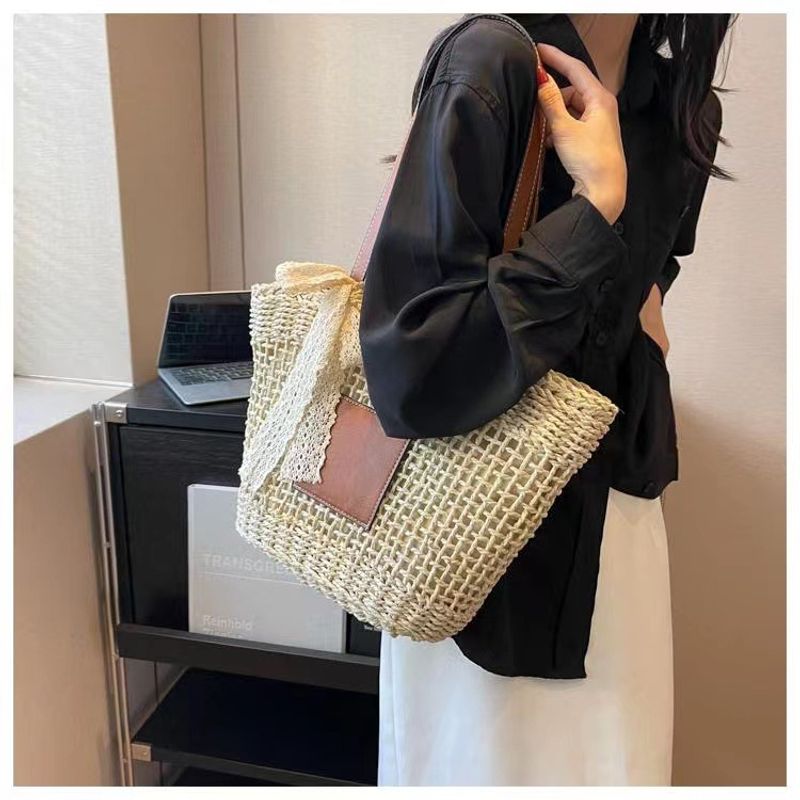 hollow shoulder new simple straw woven holiday style beach versatile women's bag_voghion.com