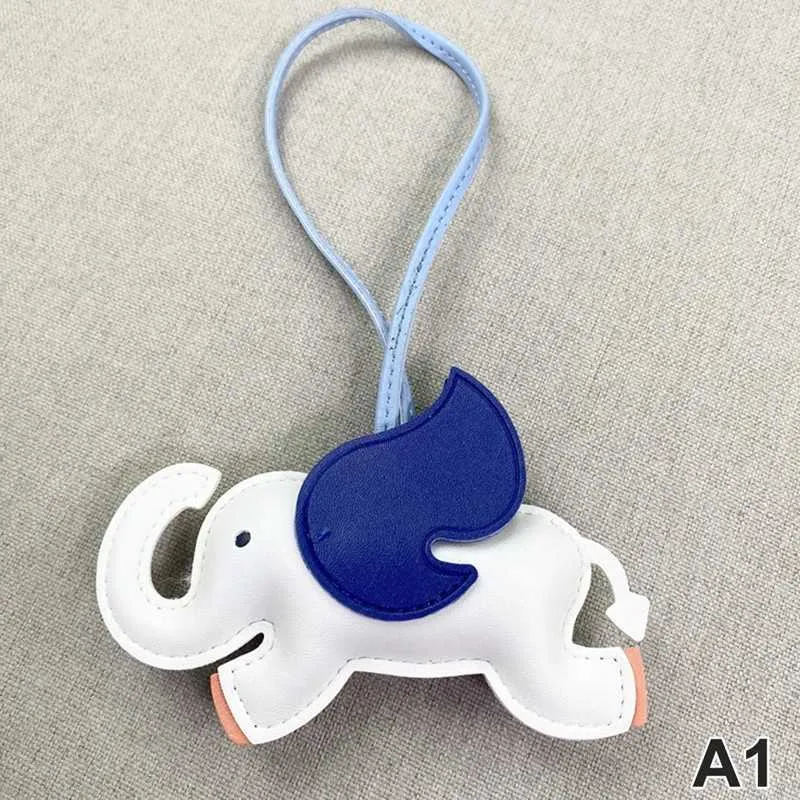 Designer de modă din piele PU aripi zburătoare elefant umeraș breloc pandantiv pentru femei accesorii pentru geantă de mână_voghion.com