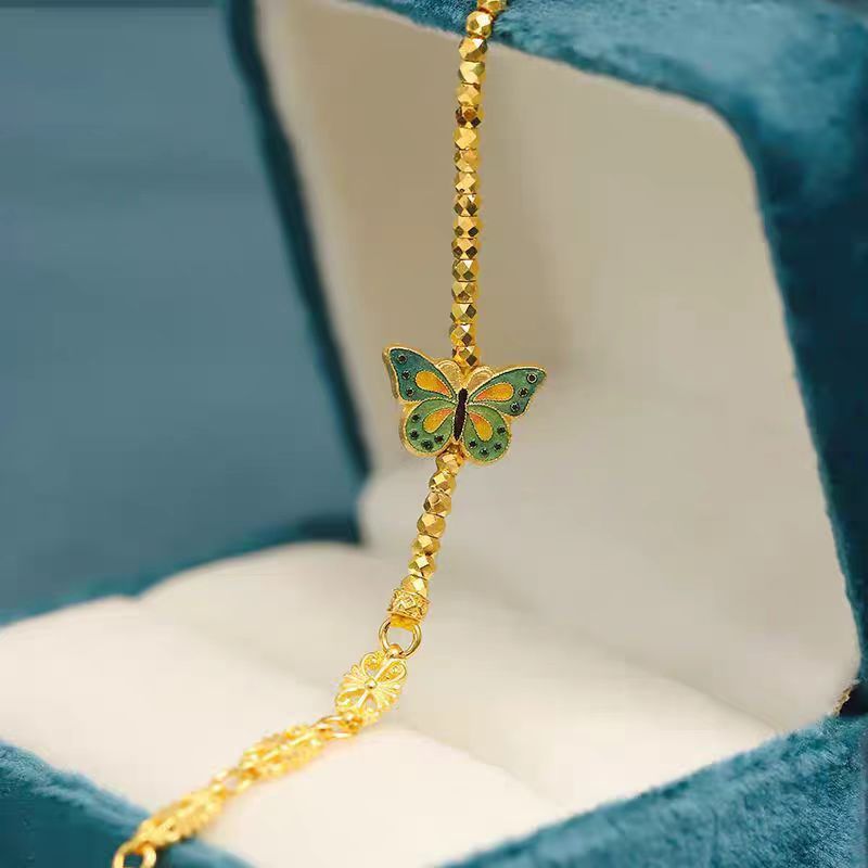 Prinsessan på flykten Bränd blå fjäril guldfärg blinkande laser trasigt Sier några få taels av disco pärlor armband_voghion.com