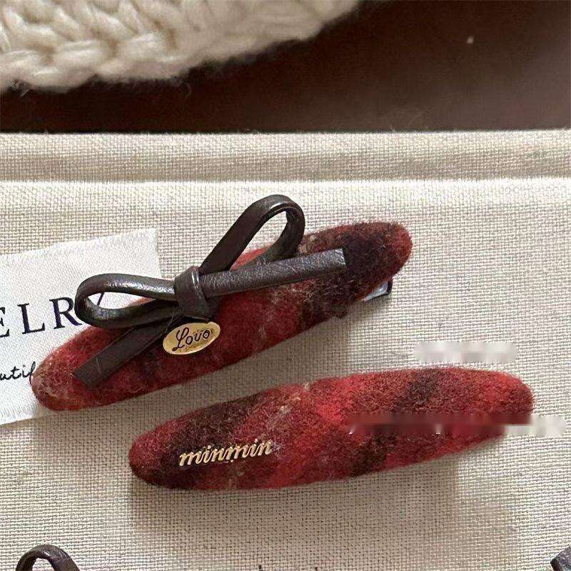 Fermaglio a fiocco rosso a quadri per accessori capelli invernali_voghion.com