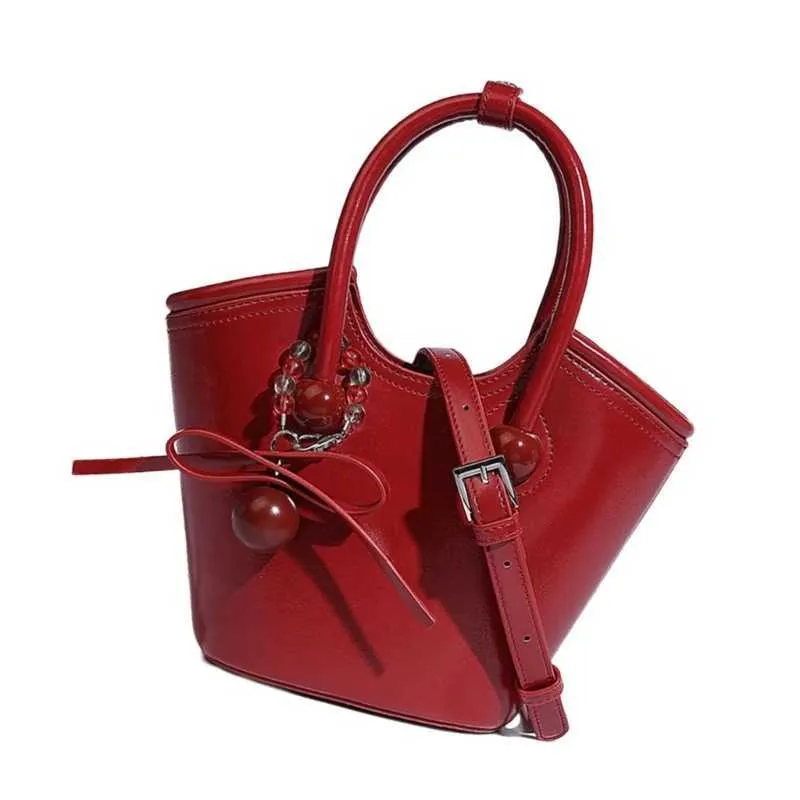 Elegante borsa a tracolla multiuso con accessorio pendente, borsa a tracolla per studenti e moda_voghion.com