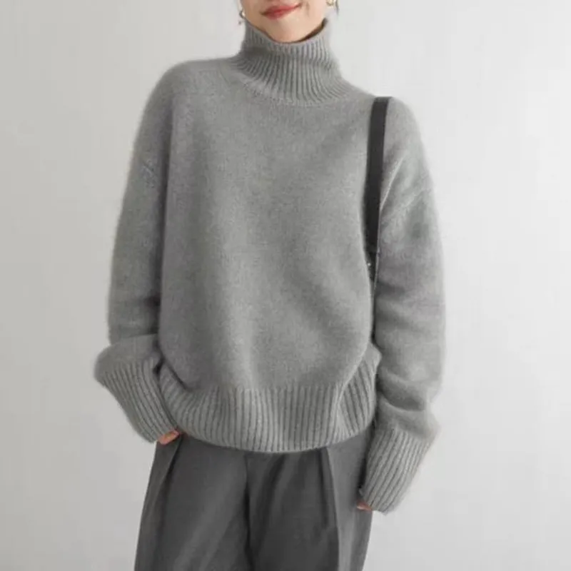 Pulls pour femmes Pull tricoté en cachemire pour femmes Élégant col haut Col roulé Lâche Épaissir Chaud Couleur unie_voghion.com