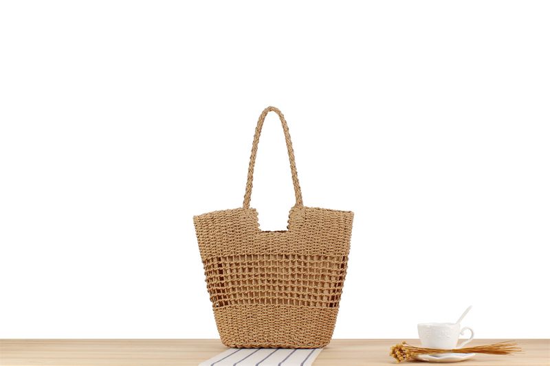 Gewebte Tasche aus Papierseil, neue französische Nischen-Hohlgewebetasche, eine Schulter, handgehaltene Strandtasche mit_voghion.com
