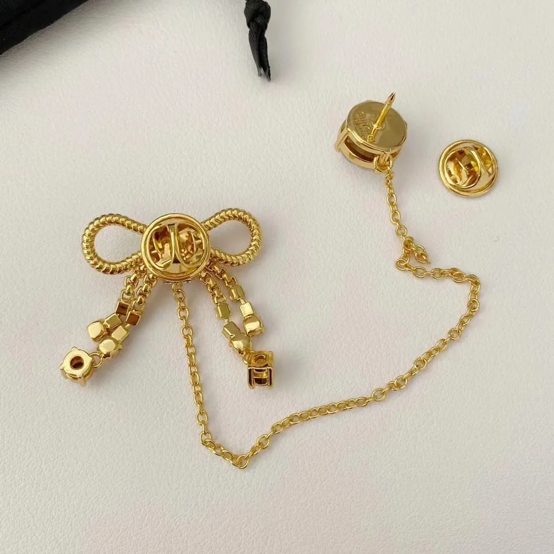 Mu marke designer brosche shing Kristall süße bogen charme dame pins für frauen nette bowknot broche broschen partei schmuck_voghion.com