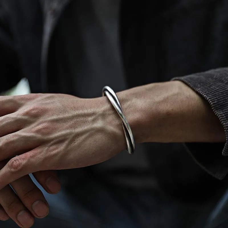 Bracciale rigido twist vintage da uomo gioiello argentato_voghion.com