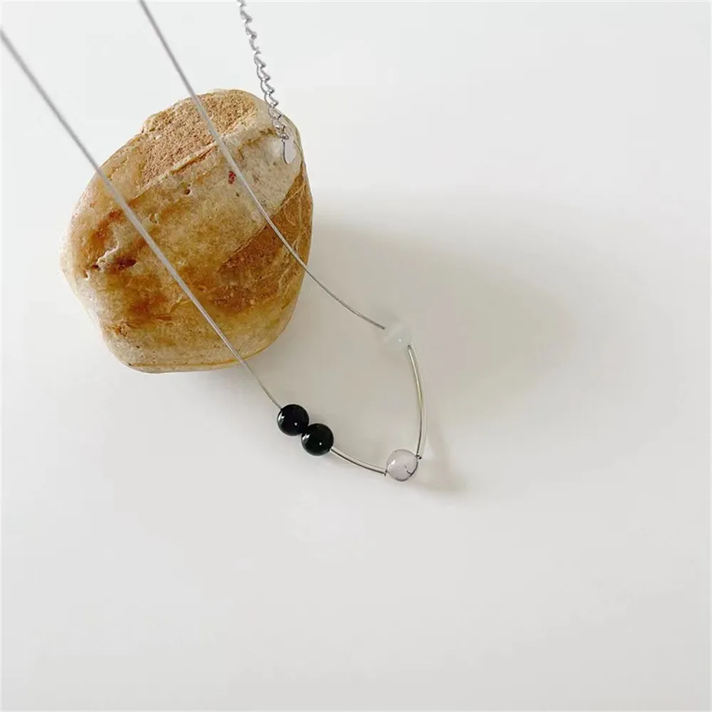 Collier pendentif vintage en pierre opale et choker en acier_voghion.com