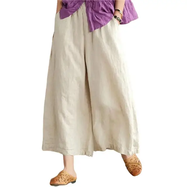 Pantaloni da donna estivi e primaverili a gamba larga oversize dritti tinta unita elasticizzati in vita abbinati con tasche superiori con cavallo profondo e nono_voghion.com