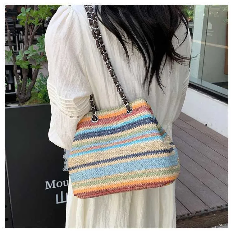 Borsa a secchiello color arcobaleno da donna, con catena a strisce a contrasto, borsa a tracolla, grande capacità, casual, intrecciata da donna_voghion.com
