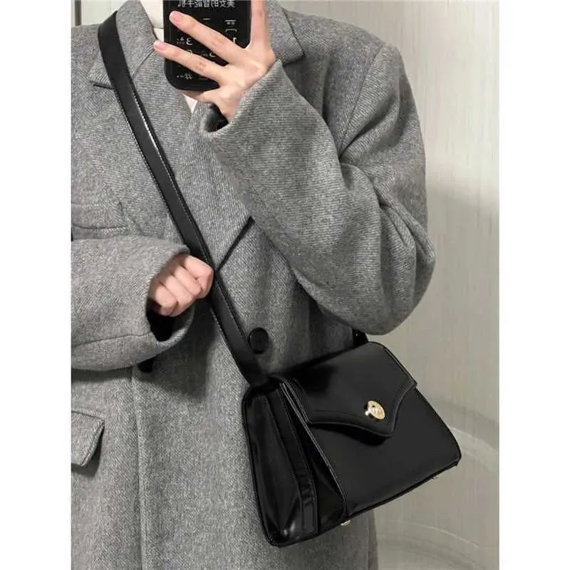 Black PU Leather Single Shoulder 2023 New Womens Buckle High Capacity Underarm Bag Designer Advanced Texture Ladies_voghion.com