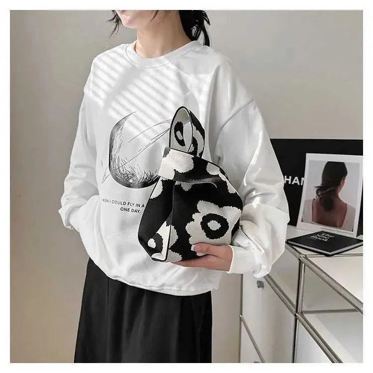 Borsa a mano in tela artistica giapponese di grande capacità, modello Geely, portafoglio con nodo casual e borsa da polso alla moda e versatile Wens_voghion.com