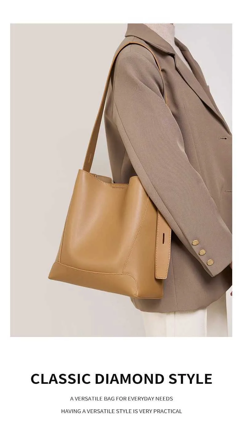 100% genuine leather shoulder large capacity denim bucket fashionable and casual womens cross bag 2391 Y241121_voghion.com