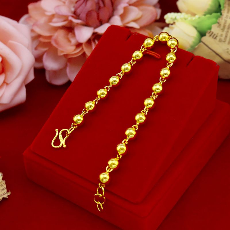 Bracciale con perline dorate da donna elegante tondo liscio_voghion.com